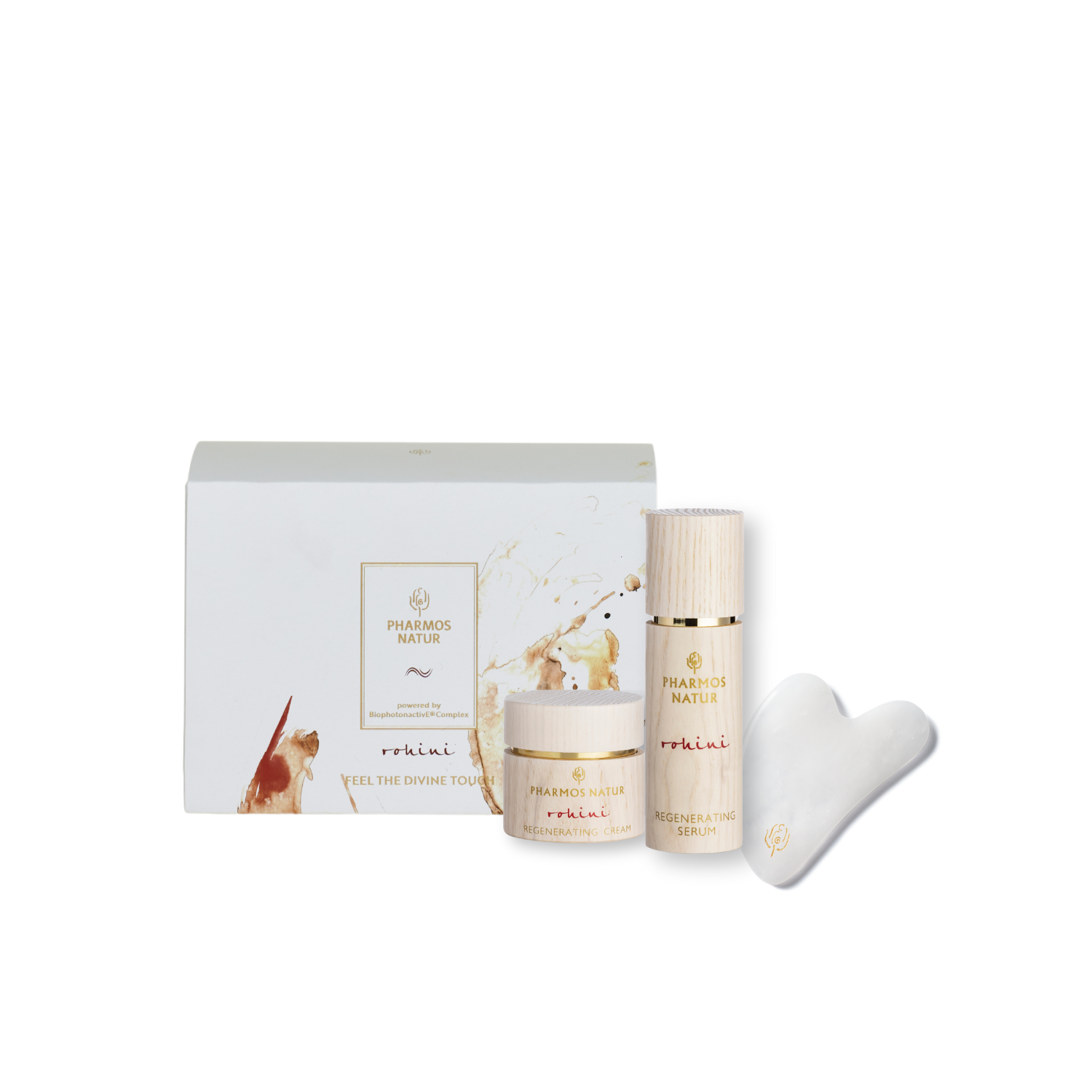 Rohini Geschenkset Feel the Divine Touch Regenerating Serum und Regenerating Cream und Bergkristall Gua Sha vor luxuriöser Verpackung 