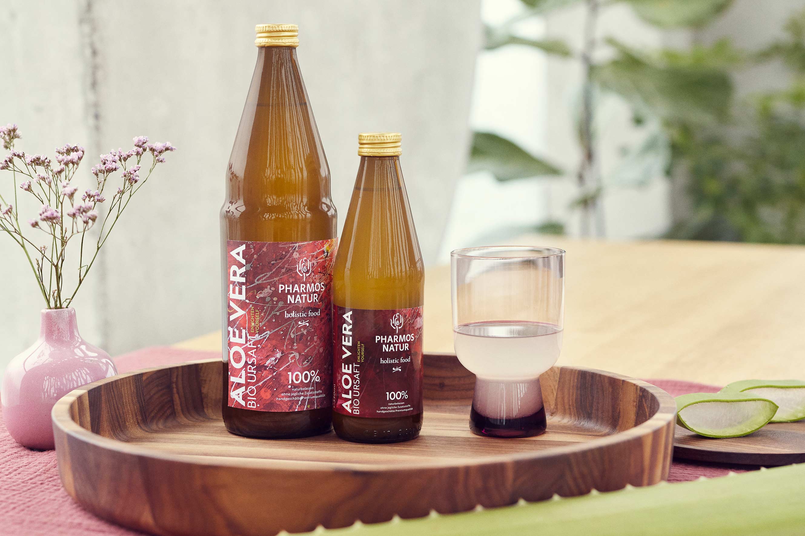 Flaschen Aloe Bio Ursaft Große und kleine Flasche Aloe Bio Ursaft